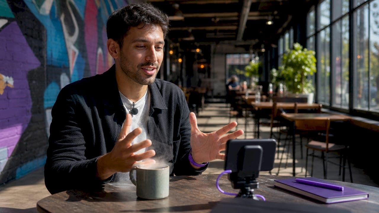 Content creator recording social video with lavalier mic